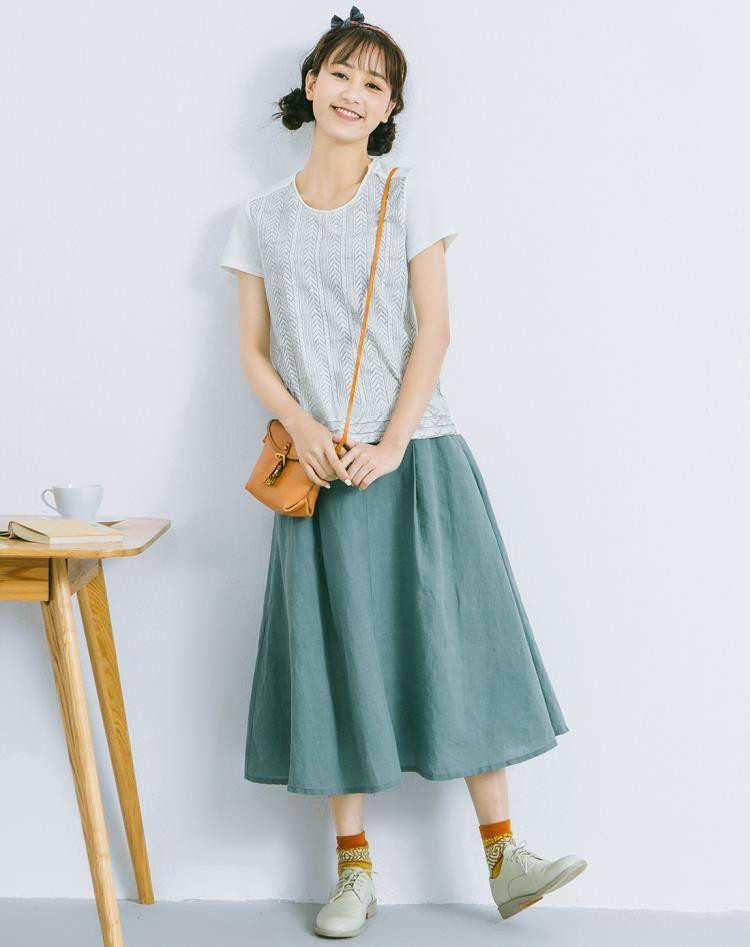 豆绿色气质单扣半身裙