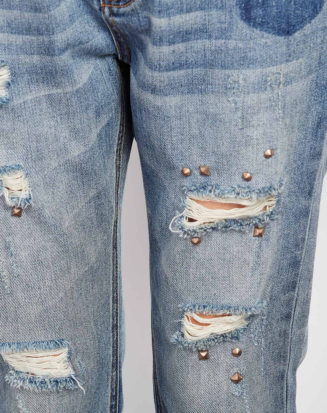 浅蓝色铆钉破洞牛仔裤