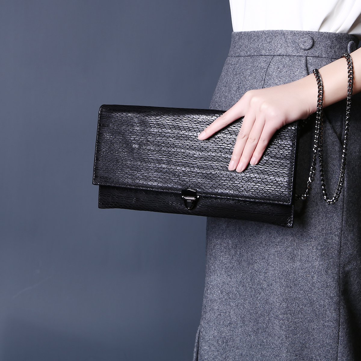 xangirl 2018新款潮流气质拉链头层牛皮中包女款手拿包