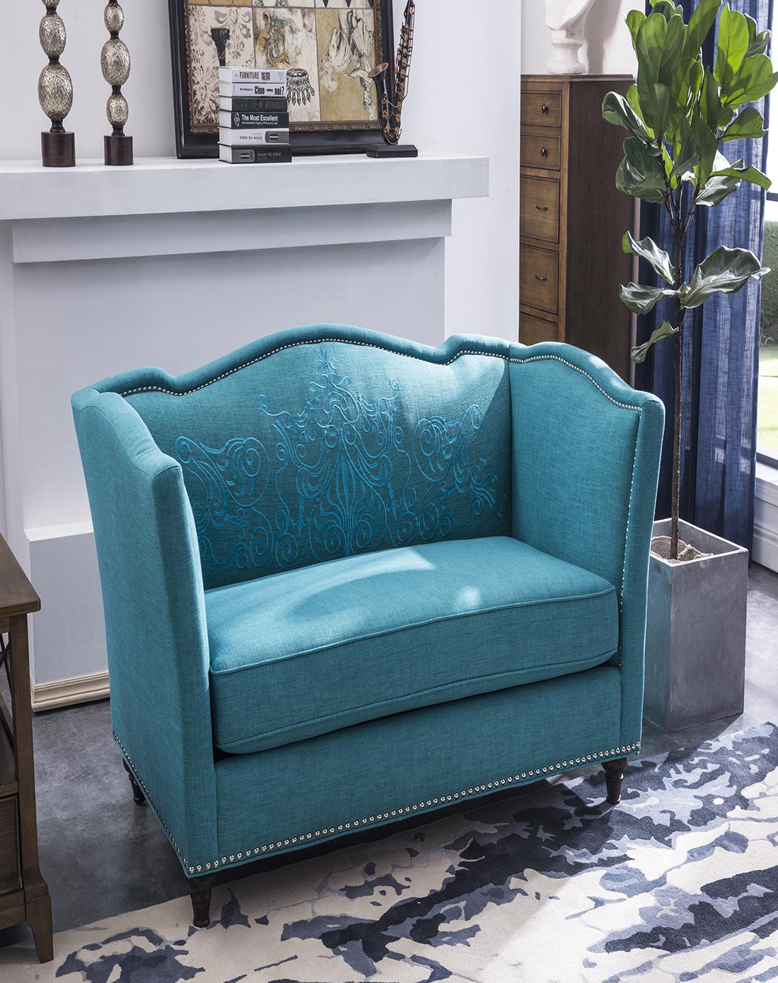 sten斯滕孔雀蓝纹饰布艺铆钉单人沙发