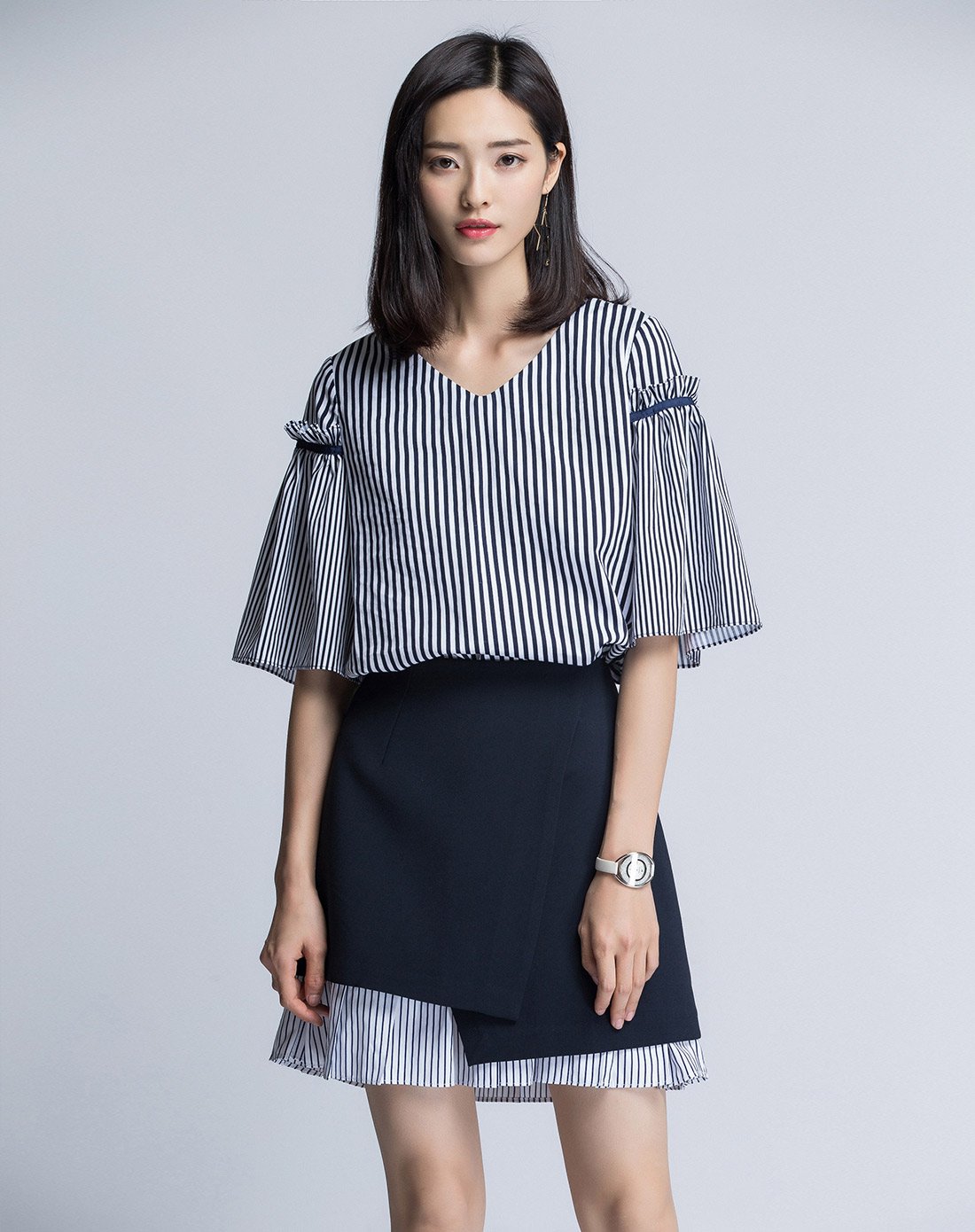 新貌美职场-优衣美女装专场 条纹不对称拼接半身裙藏青色 商品编码:yx
