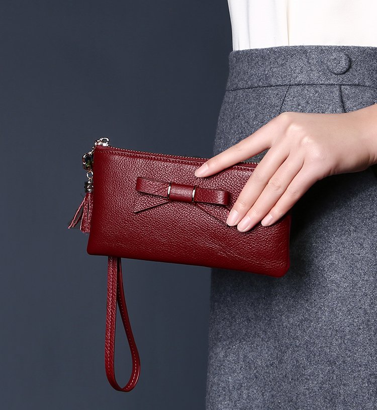 2017年新品时尚牛皮手抓包蝴蝶结百搭女款手拿包小版