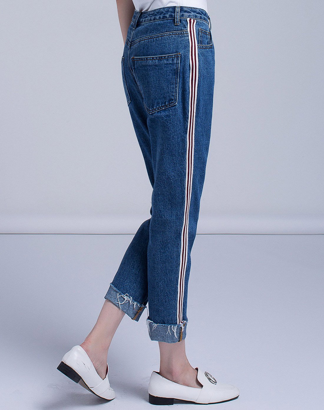 织带拼接裤脚翻边显瘦牛仔小脚八分裤